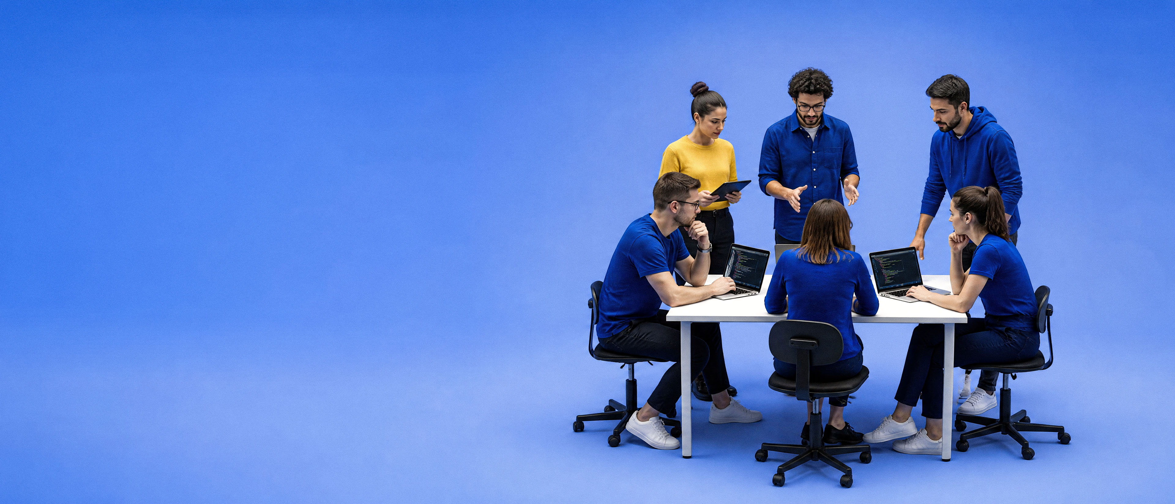 Blue Code team collaborating around a table